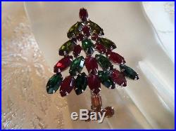 VINTAGE NAPIER CRYSTAL. CHRISTMAS TREE RED GREEN BROOCH PIN Book piece