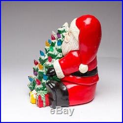 Vintage 1980's Santa Holding Christmas Tree Ceramic Figure with Light Pegs