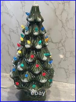Vintage 1987 green ceramic Christmas tree with star and painted snow