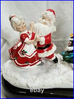 Vintage Santa & Mrs. Clause Rockin' Round the Christmas Tree ca. 1980s